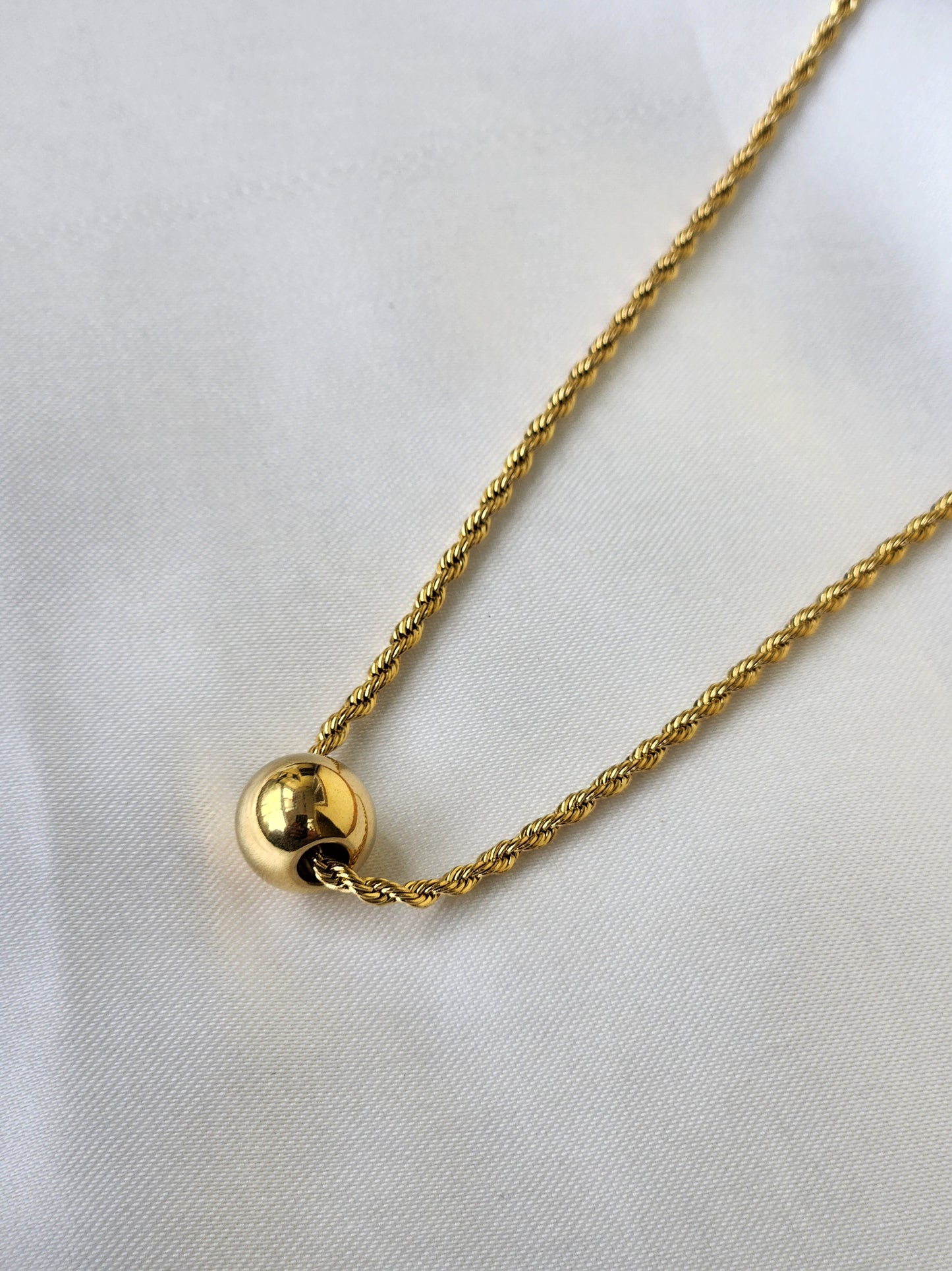 Golden Sphere Pendant Necklace