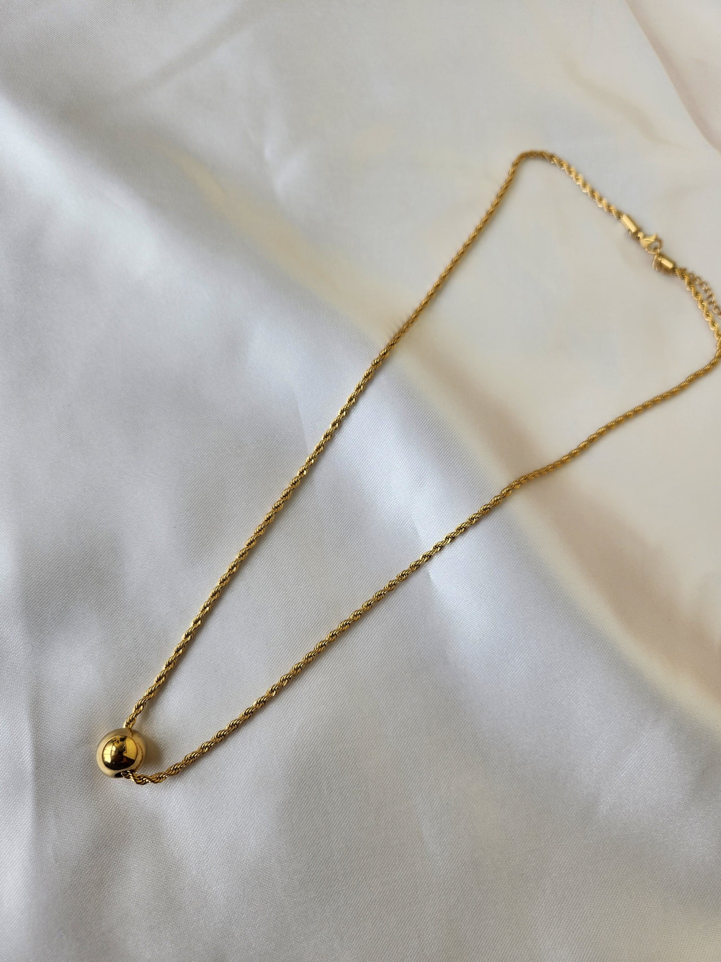 Golden Sphere Pendant Necklace